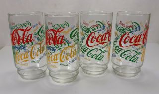 Vintage Set Of 4 Coca Cola Drink Glasses All Over Multi Color Coca Cola Logos