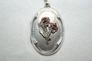 Vintage Silver Locket With Red Stones On Floral Design