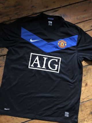 Vintage Manchester United Football Shirt.  Nike.  Size Medium.  Aig.  Rooney