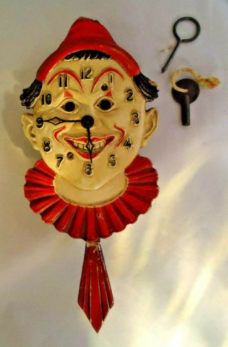 Antique Lux Clock Mfg.  Co.  Animated Clown Face Pendulum Wall Clock With Key