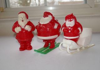 3 Vtg Irwin Rosbro Hard Plastic Santa Claus Candy Container Figures Sleigh Skis