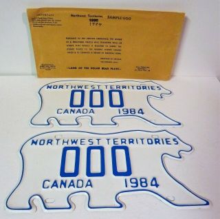 Two 1984 Northwest Territories Polar Bear Sample 000 License Plate Tag