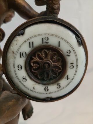 Antique Waterbury Clock Co.  Bronze Cupid statue holding Clock,  ART 3