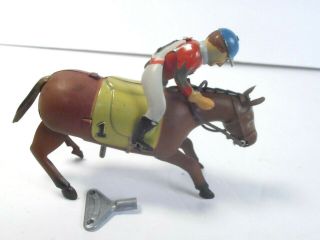 Vintage Occupied Japan 4.  5 " Tin Toy Wind Up Race Horse & Jockey Rider