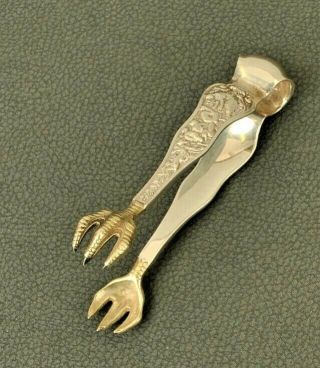 Tiffany & Co.  Sterling Silver " Olympian " Tete A Tete Tongs,  3 - 1/2 ",  C.  1878