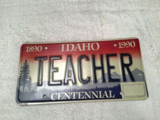 Idaho Centennial 1890 - 1990 Vanity License Plate Tag Says Teacher