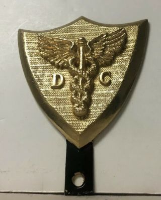 Vtg Doctor Of Chiropractic " D C " License Plate Topper Metal Brass Caduceus
