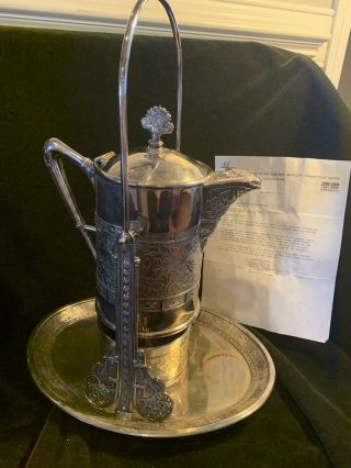 Antique Meriden Silver Plate Tilting Water Pitcher With Letter Of Provenance.