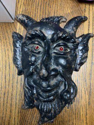 Antique Cast Iron Heavy Devil Head With Red Glass Eyes