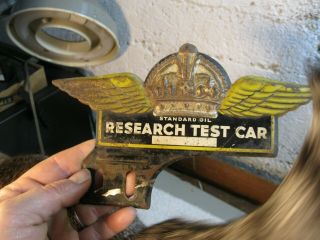 vintage standard oil research test car license plate topper 3