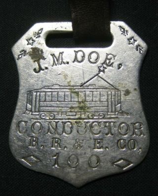 Street Railway Watch Fob - J.  M.  Doe - Conductor - B.  R.  & E.  Co.  (bangor,  Maine)