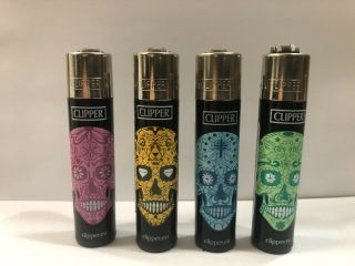 Rare Mexican Skulls 4 Clipper Lighter Set - Set Of Four