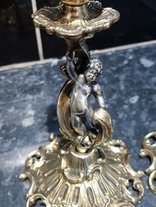 Antique French Cherub Brass candle sticks,  Matching Pair,  with Rd numbers 2