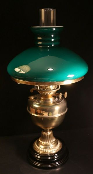 Antique Duplex Brass Oil Lamp On Black Ceramic Base With Cased Emerald Shade