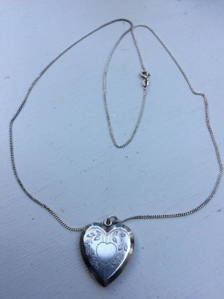 A Stunning Vintage Silver Heart Shaped Locket Pendant And 24 Inch 925 Chain.