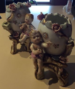 Vintage Porcelain Bisque Cupid Cherub Boy Figurine Flowers Vase Pink Pair 5 3/4”