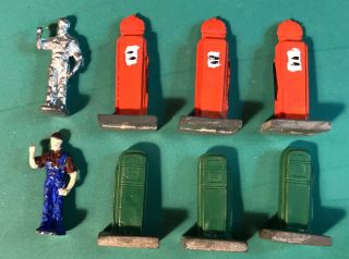 6 Vintage 1940s White Cast Metal Red And Green Gas Pumps,  With 2 Gas Attendants