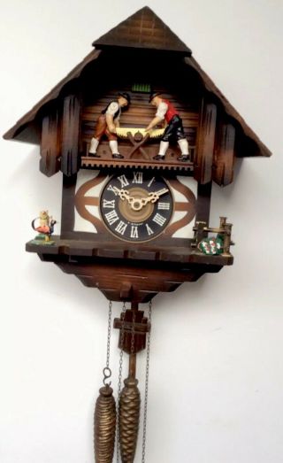 Antique Black Forest German Cuckoo Clock With Sawing Man