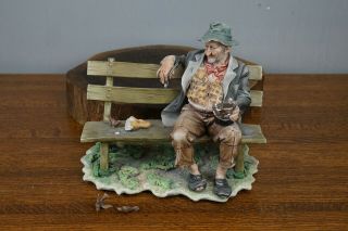 Vintage Capodimonte Tramp On Bench Eating Signed By Capodimonte