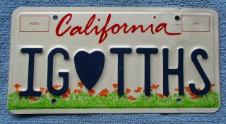 California " Kids " Graphic Personalized Vanity License Plate: " Ig (heart) Tths "