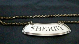 A George Iii Scottish Curved Silver " Sherry " Wine Bottle Label,  C.  1800