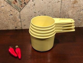 Set Of 4 Vintage Tupperware Measuring Cups Yellow Sizes 1,  3/4,  2/3,  1/2
