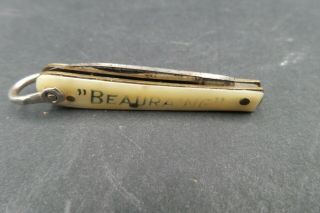 Mini Couteau Vintage Plaquette Corne Ou Nacre Marqué Beauraine Lg 4/7cm