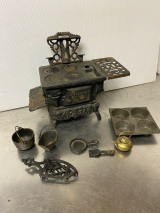 Vintage Crescent Cast Iron Mini Toy Stove With Accessories.  Made In The Usa.