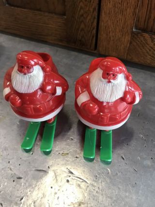 2 Vintage Santa Claus On Skis Candy Containers Hard Plastic Christmas Rosen