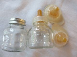 Two Vintage Glass Baby Bottles With Plastic Nipple & Ring,  Metal Storage Lid 3oz