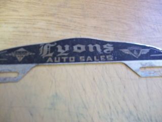 Vintage License Plate Topper: Lyons Auto Sales De Soto & Plymouth