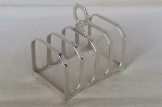 A Solid Sterling Silver Five Bar Toast Rack Birmingham 1964.