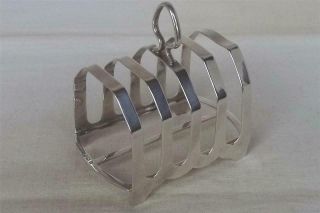 A Solid Sterling Silver Five Bar Toast Rack Birmingham 1930.