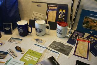 Amtrak Memorabelia,  Cups,  Route Guides,  Tote Bag,  Postcards,  Keytags,  Magnets Etc.