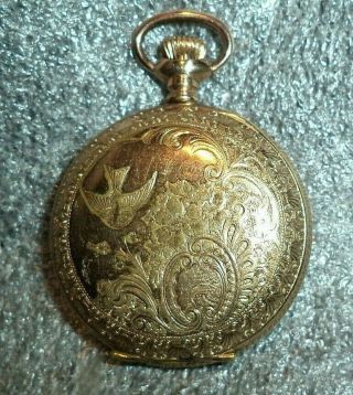 antique Seth Thomas pocket watch in ornate gold filled case runs 2