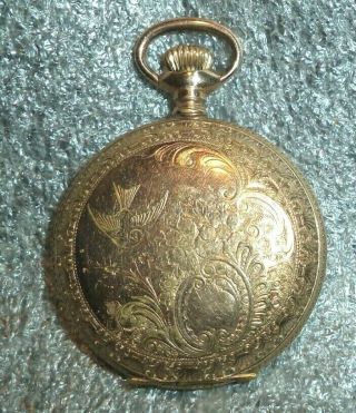 antique Seth Thomas pocket watch in ornate gold filled case runs 3