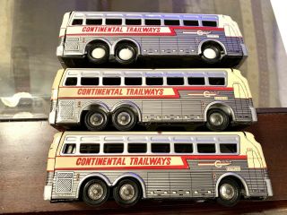Three 7” Tin Eagle 05 Continental Trailways Bus