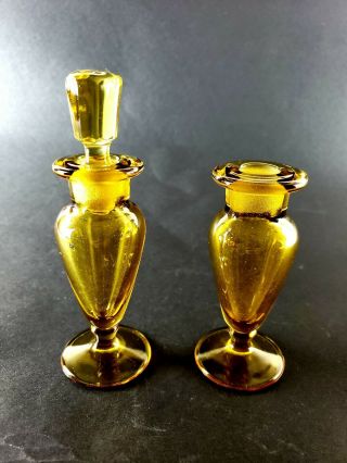 Two Fancy Vintage Perfume Bottles - Footed Amber Color Glass