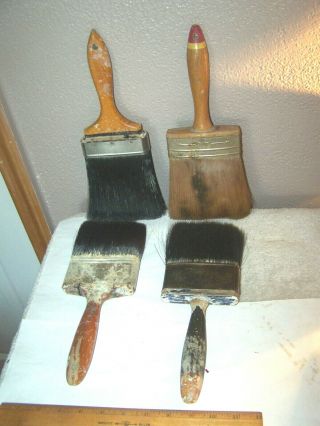 Four Vintage Wood Handled Paint Brushes
