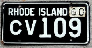 1959 White On Black Rhode Island License Plate With A 1960 Tab