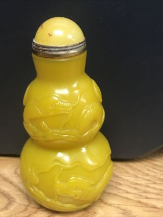 Imperial Yellow Peking Glass Chinese Snuff Bottle With Dragon Relief