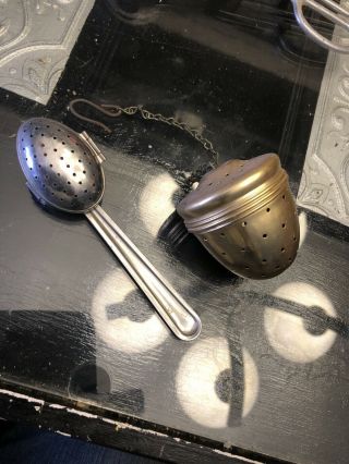 Two Vintage Tea Strainers One Spoon Hinged And One Acorn Shaped Screw On Top
