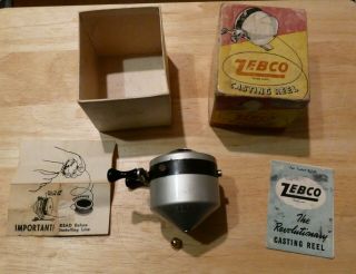 Vintage Zebco Casting Reel - Zero Hour Bomb Company - W/box And Papers - Tan Spinner
