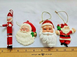 4 Vtg.  Christmas Tree Ornaments Santa Clauses,  Wood,  Ceramic,  Plastic,  Resin