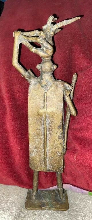 Unusual Antique Bronze Figure Formed As African Hunter Holding His Animal Kill