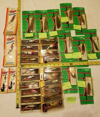 20 Mirrolures,  10 Pine Valley Flutter Spoons And 4 Mepps Syclops Fishing Lures