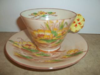 Hand Painted Split Flower Handle Tea Cup And Saucer With Lily Pad Flowers