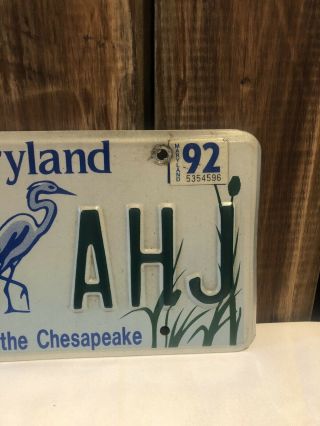 Maryland 1992 TREASURE THE CHESAPEAKE License Plate 750 AHJ ‘92 Sticker 3