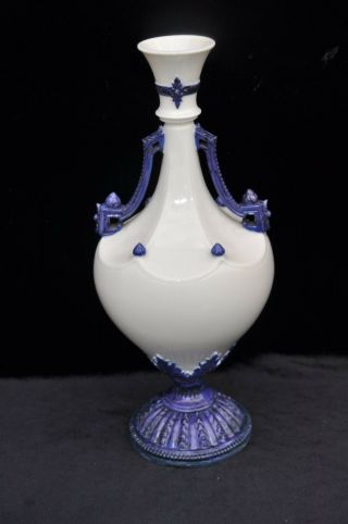 White Opaline Baluster Vase With Blue Ground Handles And A Blue Base,
