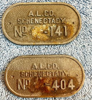 Two American Locomotive Company Alco Railroad Casting Id Tags